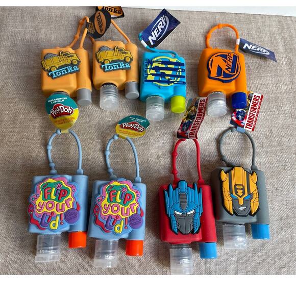 Hasbro Transformers Tonka Play Doh  Nerf Lip Balm Pocketbac Holders Lot Of 8 New - Picture 1 of 2
